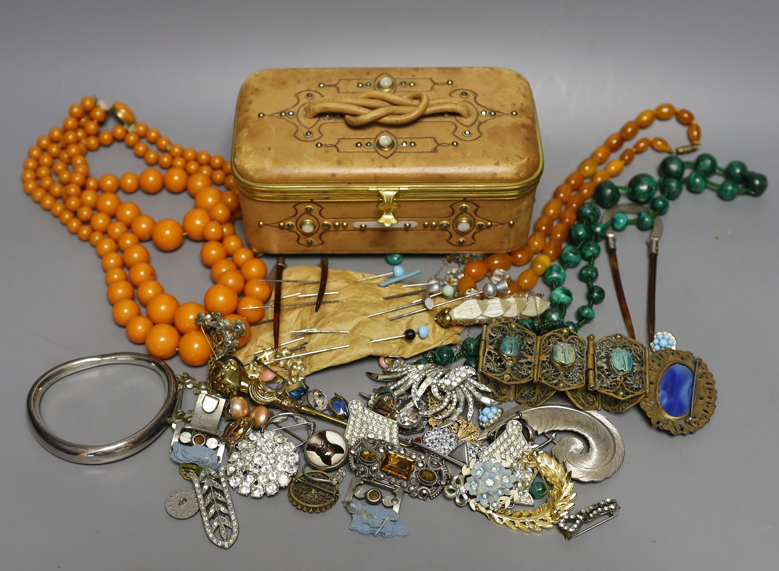 A 19th century calf skin and cut steel mounted trinket box and assorted costume jewellery, including a malachite necklace.